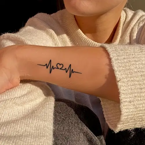 Minimalist Tattoos: The Latest Trend in Body Art 4 437078c3 8e1b 4e93 af6a 420082cf3648