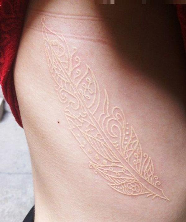 Cover-Up Tattoos 2025 – How to Transform Old or Unwanted Ink 4 54 White Ink Feather Tattoo