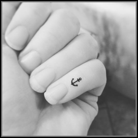 Minimalist Tattoos: The Latest Trend in Body Art 21 61507c3f28ed656ee8482826aa335a5a