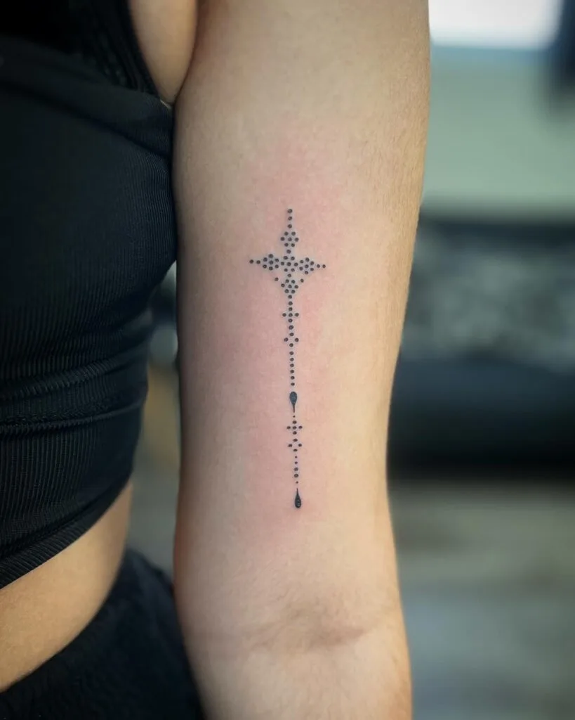 Small Tattoos with Big Meanings – 2025 Guide to Subtle Body Art 10 Dotwork Cross