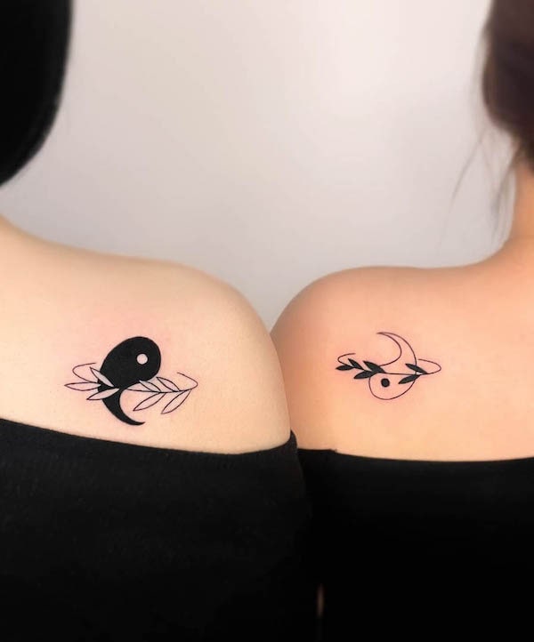 Meaningful Tattoo Designs with Deep Symbolism 13 Floral yin yang tattoos for sisters by @mauve tattooer