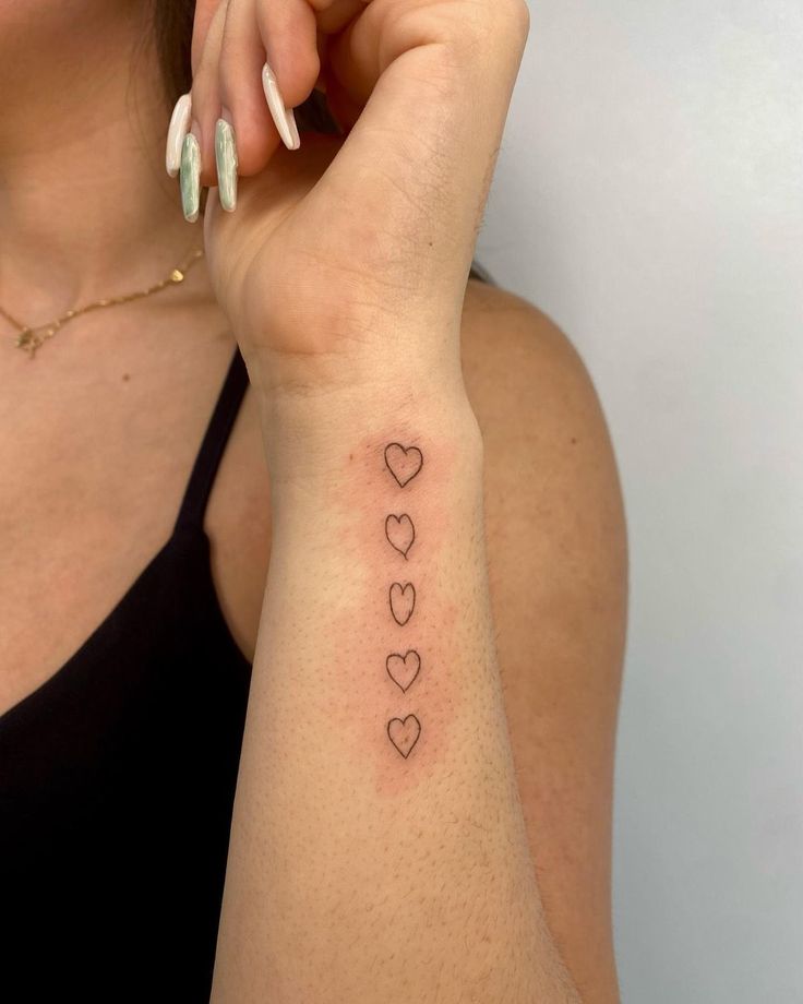 Minimalist Tattoos: The Latest Trend in Body Art 17 a77015c0f7c5d8b62a134bbbddeb38ff