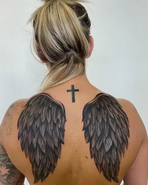 Top 30 Small Tattoo Ideas for Women in 2025 25 angel wing tattoo meaning 24.jpg