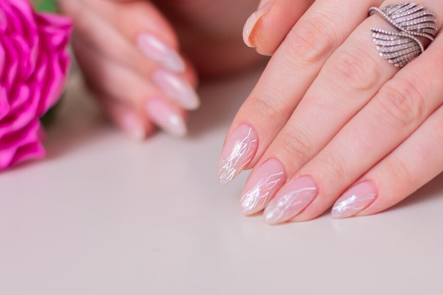 The Ultimate Guide to Nail Shapes – How to Choose the Perfect One 8 female hands with wedding manicure nails 285484 2022