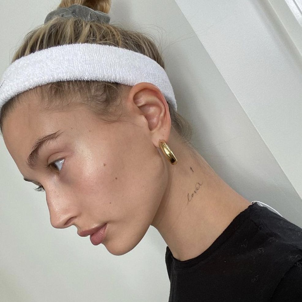 Celebrity Tattoos and What They Mean 13 haileybieber b1076f622e6c43478fb8ef9d596237b2