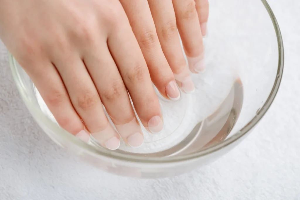 Nail Growth Secrets: Natural Ways to Strengthen and Lengthen Your Nails 10 hands in water.jpeg