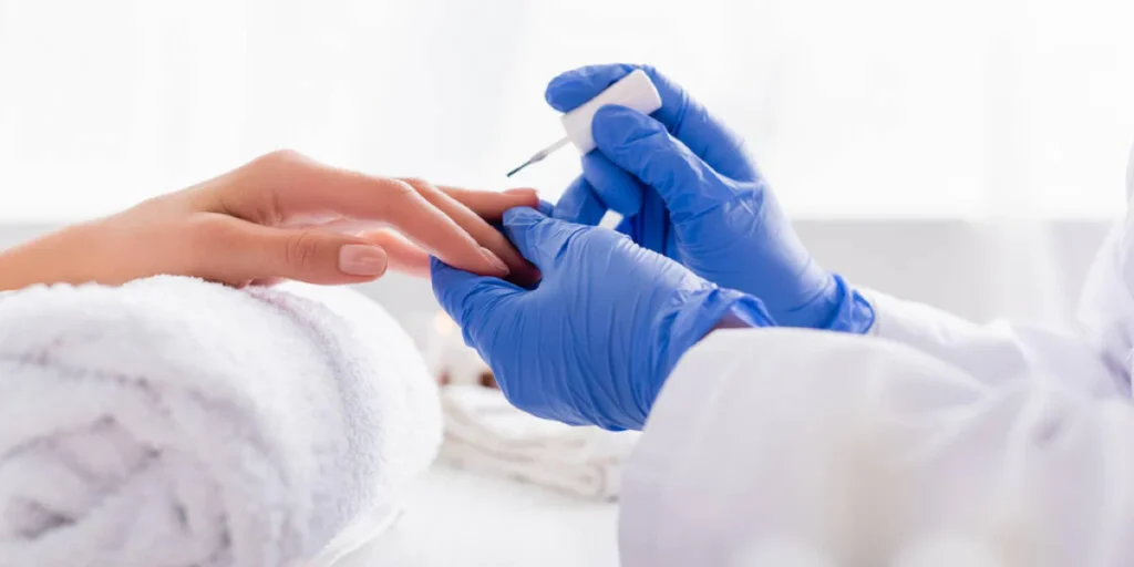 How to Make Your Manicure Last Longer: 15 Expert Tips 14 nail salon gloves 1