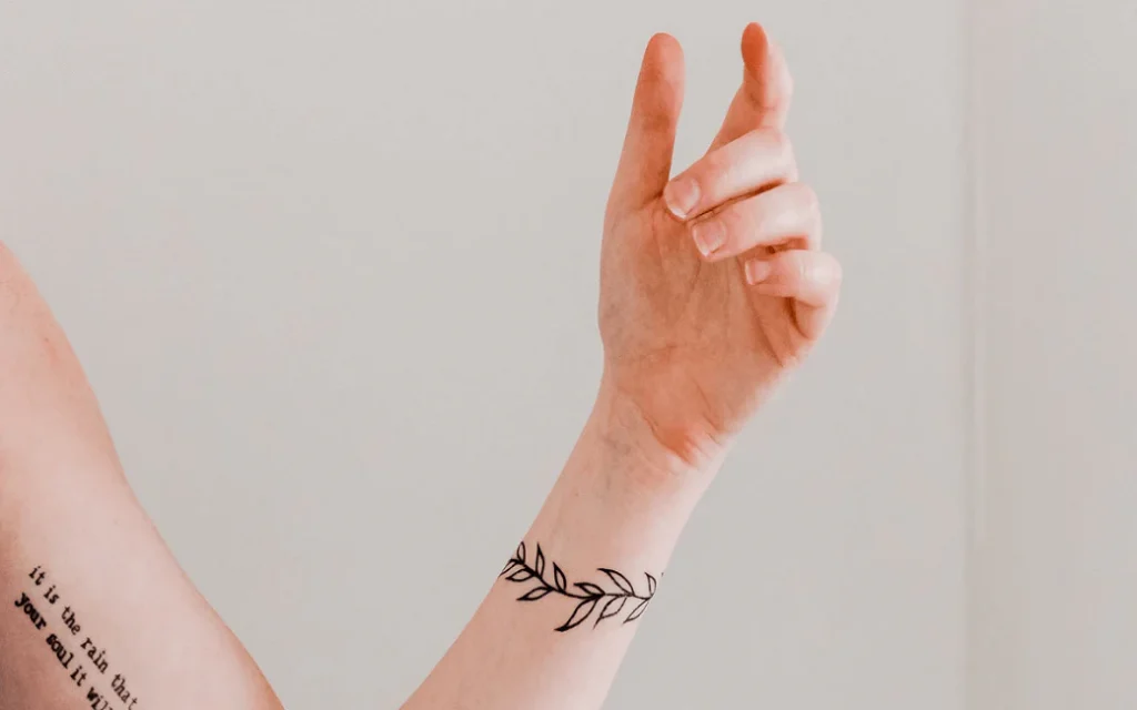 Tattoo Cover-Ups vs. Laser Removal: Which Option is Right for You? 4 tattoo on arms