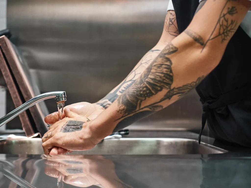 Tattoo Aftercare 101: How to Heal and Protect Your New Ink 3 washing new tattoo